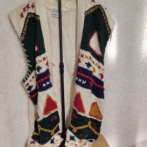 Stunning Diamond Hill hand-knit cardigan, featuring bold folk-inspired patterns